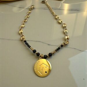 Pulsera Acuario en Acero Dorado  con las Piedras del Signo