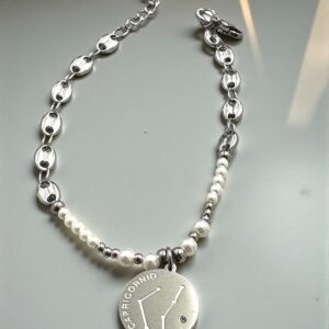 Pulsera Capricornio en Acero Plateado  con las Piedras del Signo