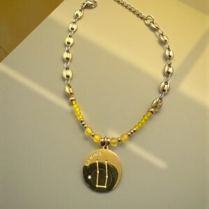 Pulsera Geminis en Acero Dorado  con las Piedras del Signo