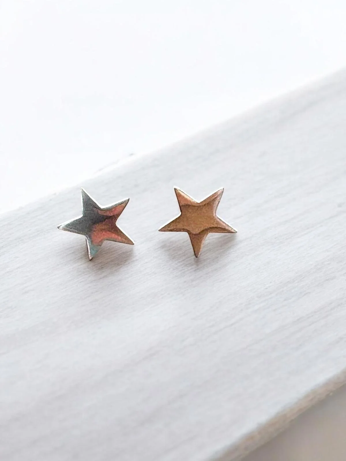 Pendiente Estrella en Acero Plateado