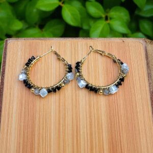Aros Dorados en Acero con bolas negras y grises