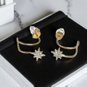Pendiente en Acero Dorado con Estrella y Circonitas