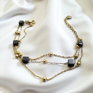 Pulsera Triple con Bolitas y Cuadrados Negros en Acero Dorado