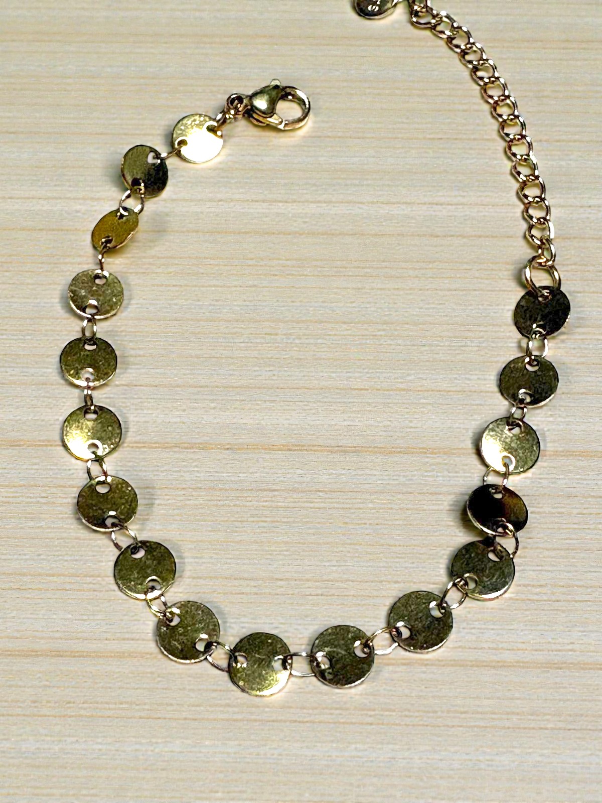Pulsera chapitas redondas en acero dorado