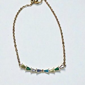 Pulsera circonitas triangulo colores en acero dorado