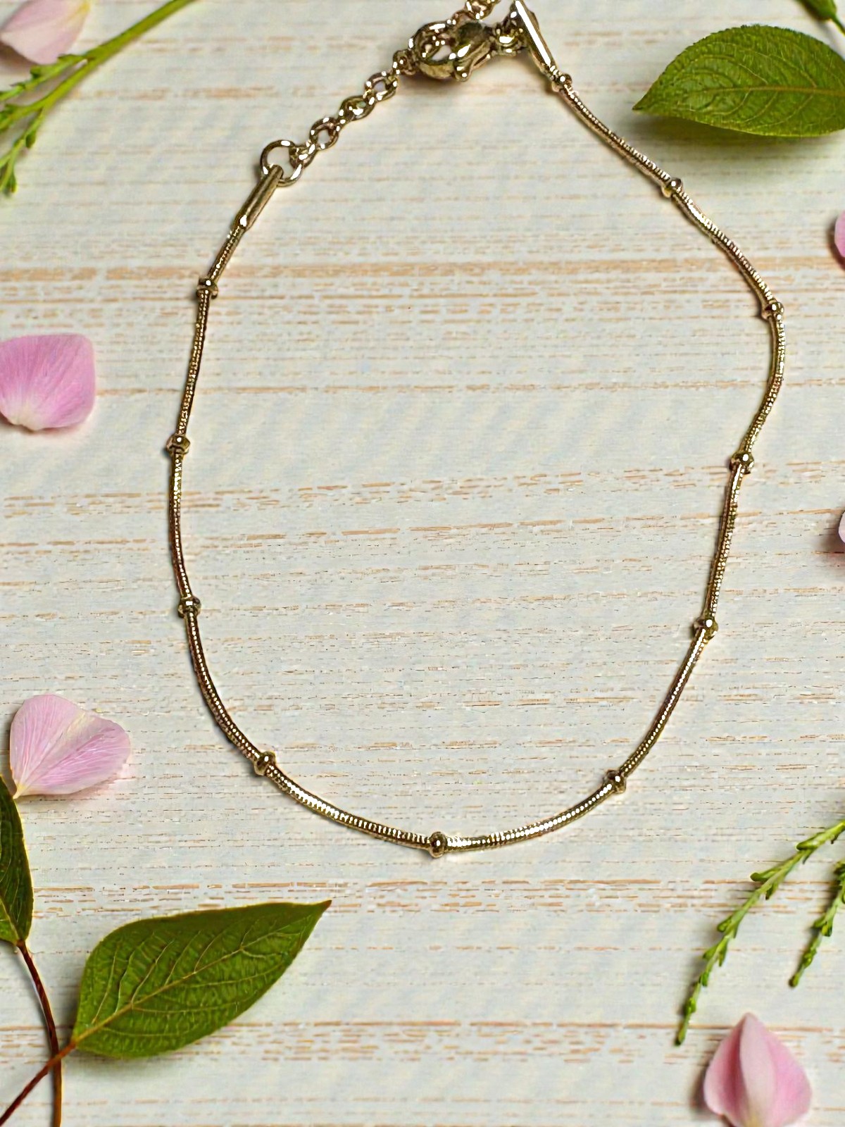 Pulsera cola ratón en acero dorado