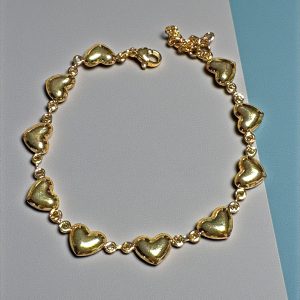 Pulsera corazones entera en acero dorado
